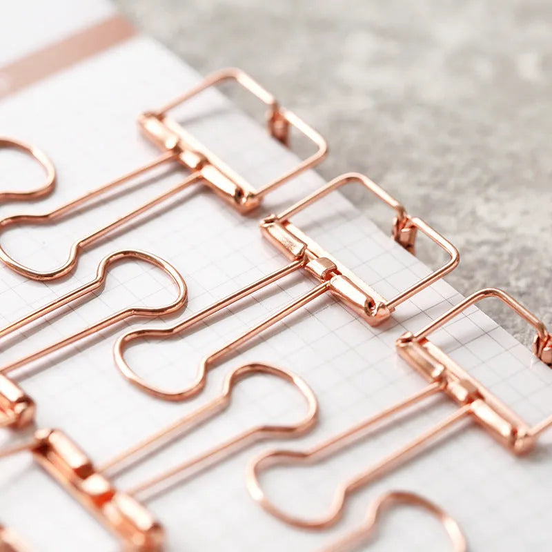 Rose gold metal binder set with ticket holder and data folder, small and large sizes on white background
