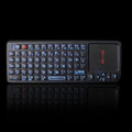 Black wireless mini keyboard with touch screen, shown next to a ruler indicating its 151mm length.