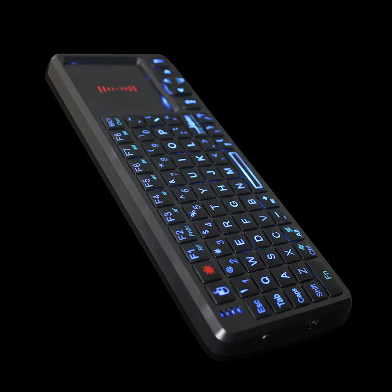 Black wireless mini keyboard with touch screen, shown next to a ruler indicating its 151mm length.