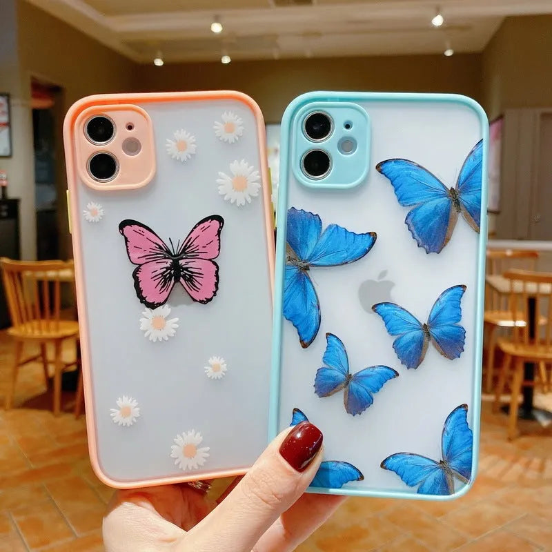 Butterfly design iPhone case with acrylic back and soft edge in pink, purple, and light blue colour options.