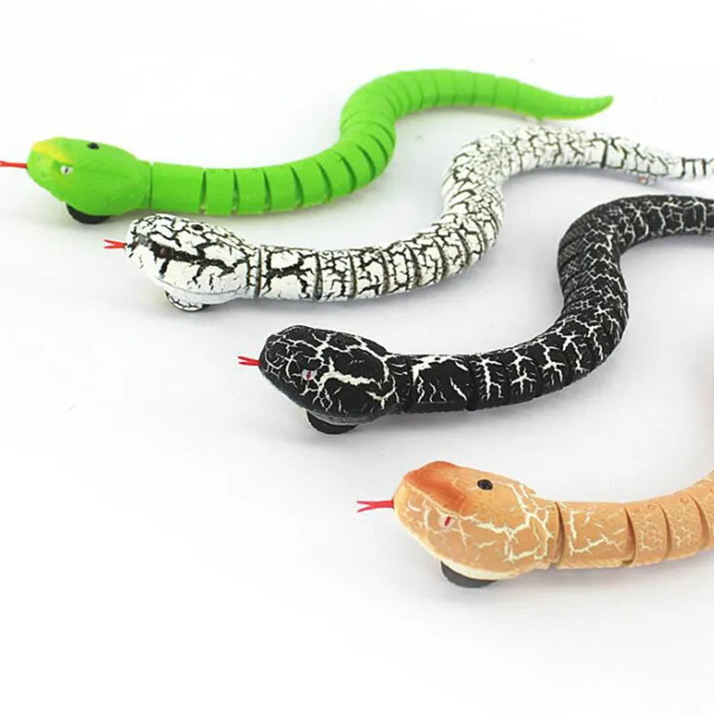 Black and grey cobra remote control snake toy with USB charging cable and batteries
