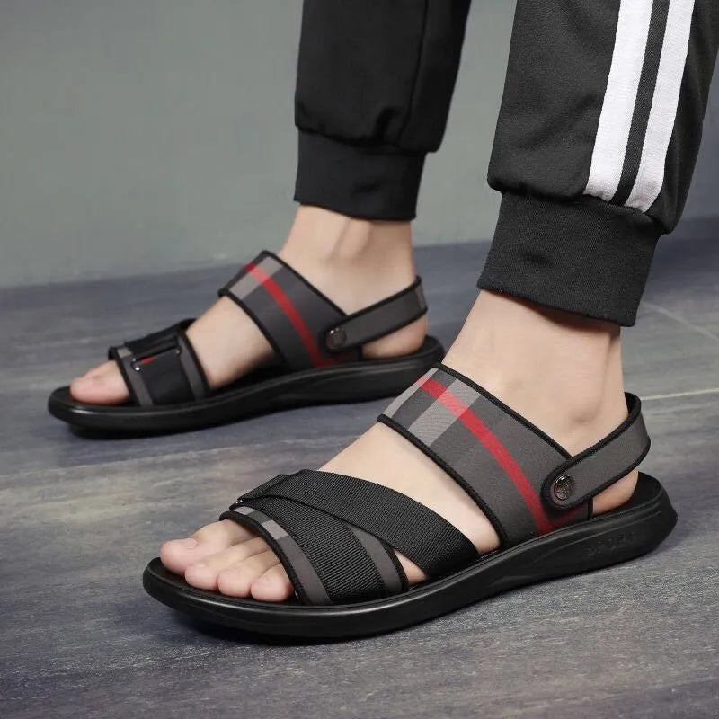 A pair of leisure sports sandals with a Lycra upper and polyurethane sole on a summer background.
