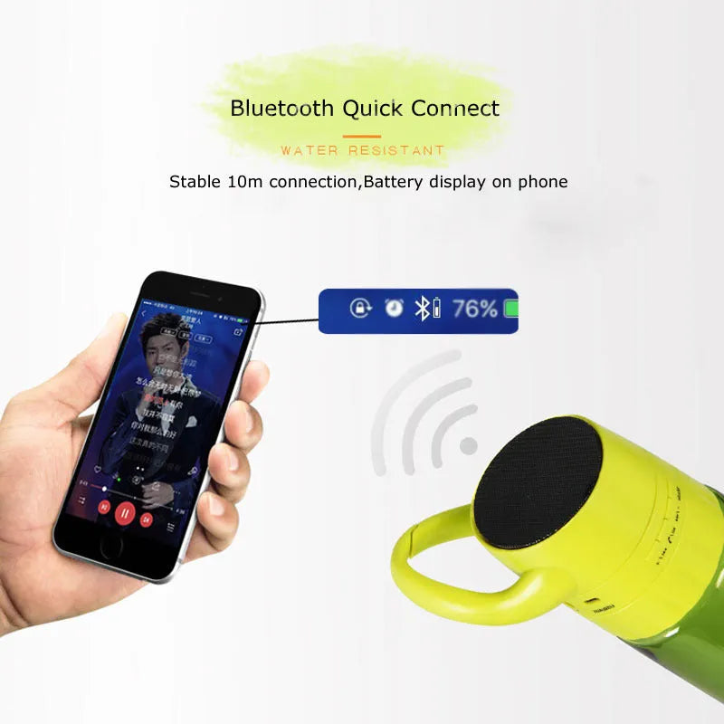 750ml orange PC plastic cycling water bottle with integrated Bluetooth audio speaker on outdoor background