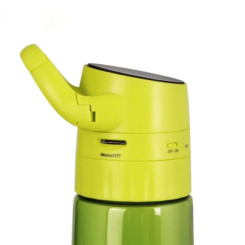 750ml orange PC plastic cycling water bottle with integrated Bluetooth audio speaker on outdoor background