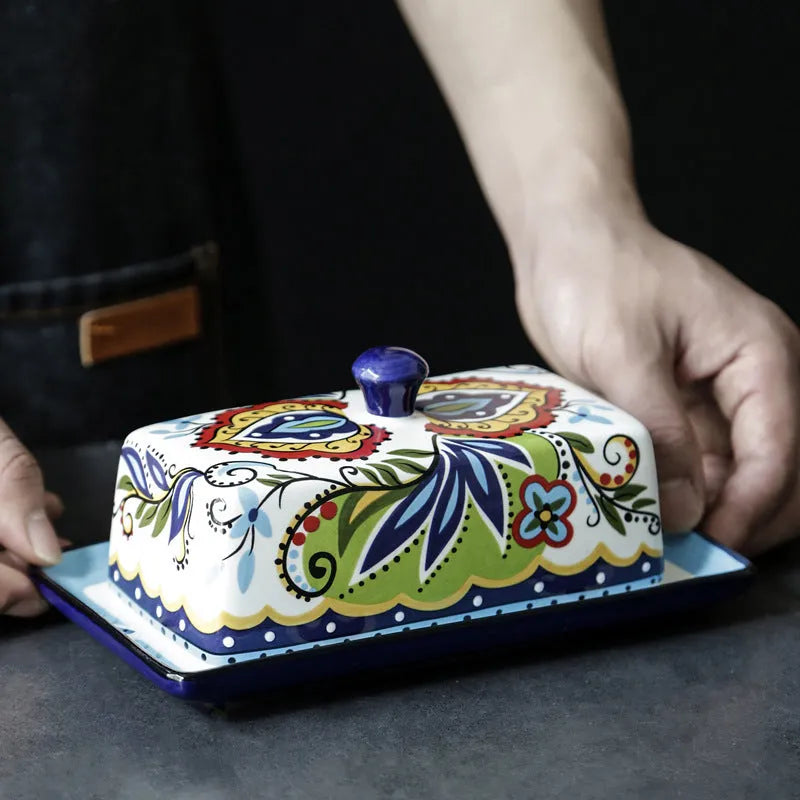 Square ceramic butter box with lid showing floral pattern decoration in blue colour option