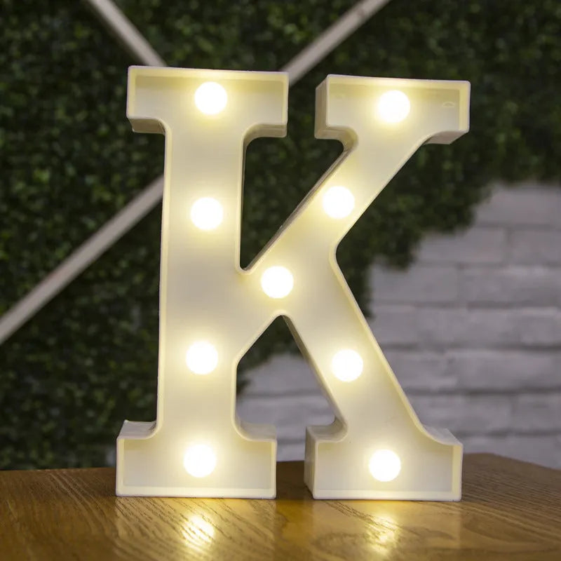 White plastic LED marquee letter sign with warm white glow, 22cm tall