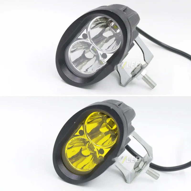 Direct selling motorcycle LED spotlight with aluminium housing in white and yellow light options on dark background