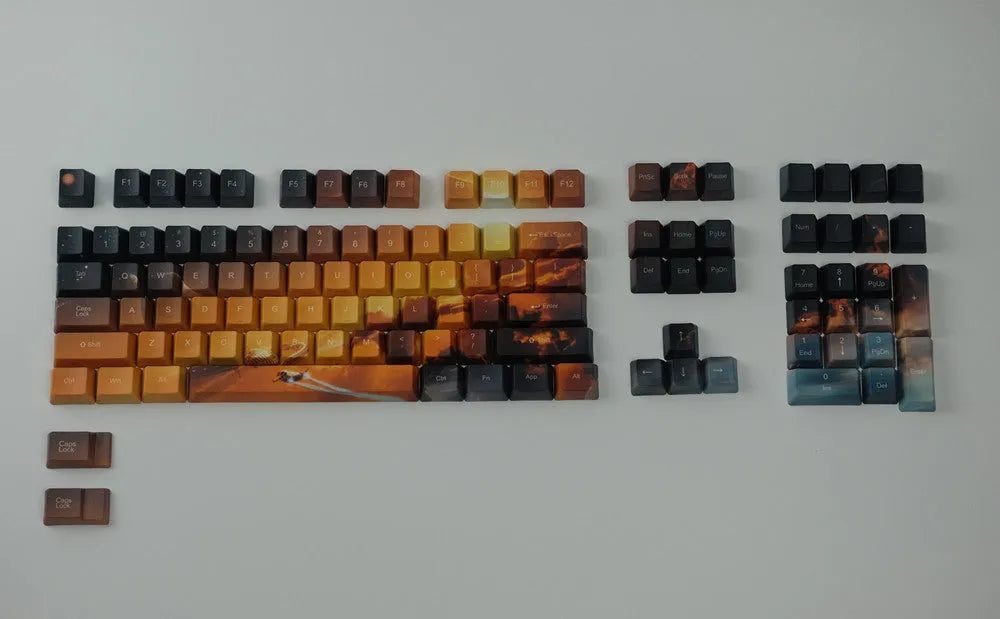 Saturn engraved mechanical keyboard keycap set showing front and side engraving styles