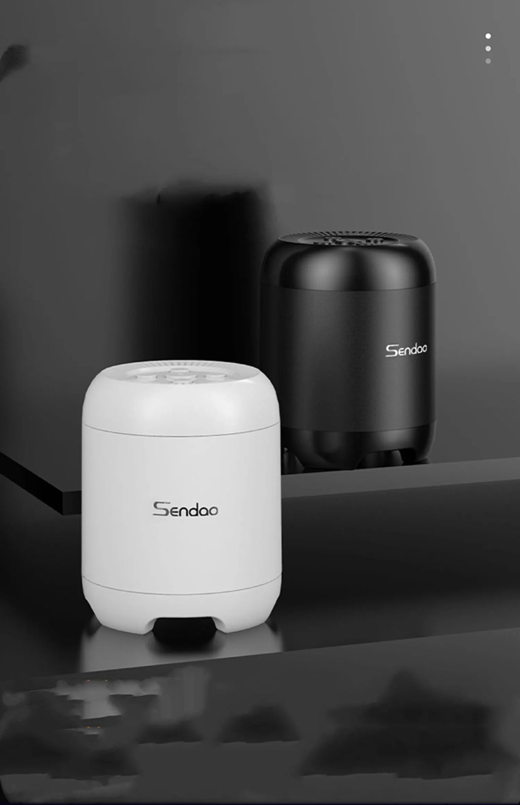 Small black wireless Bluetooth speaker with super subwoofer showing USB port and card reader slot
