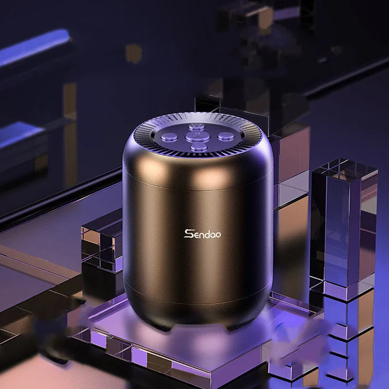 Small black wireless Bluetooth speaker with super subwoofer showing USB port and card reader slot