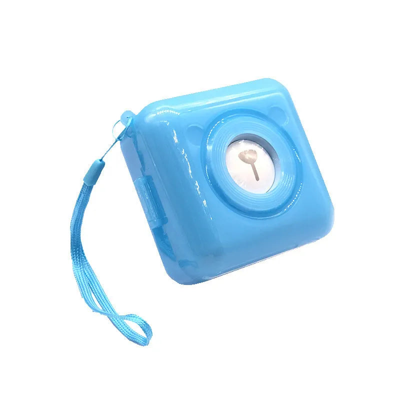 Portable handheld mini thermal printer in white with 7.9cm dimensions and a roll of thermal paper