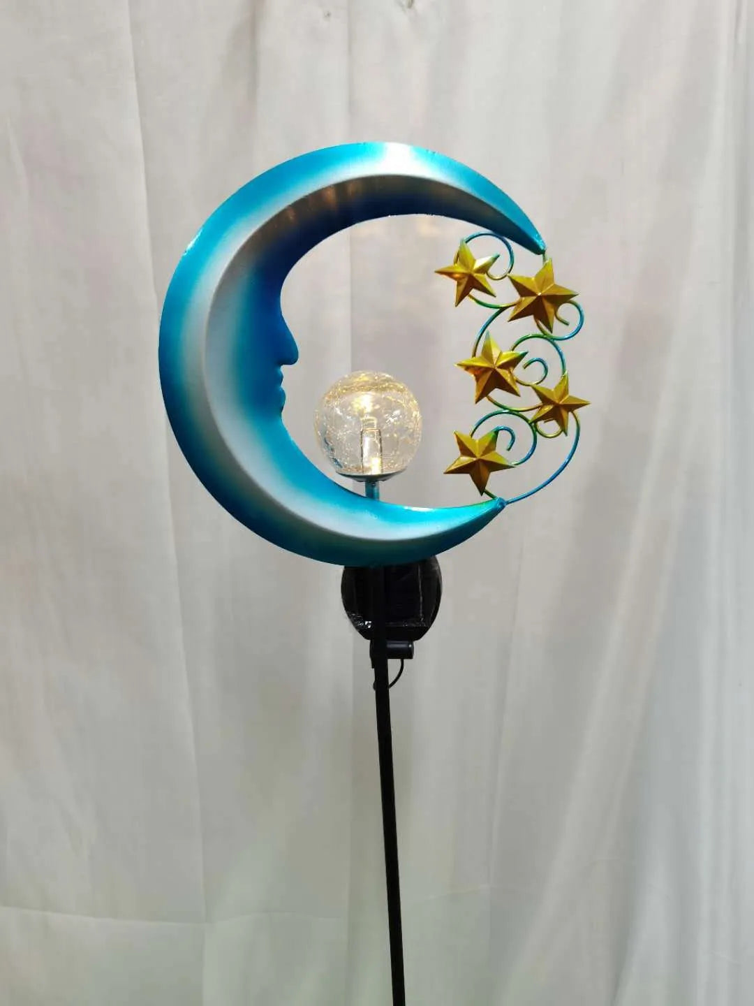 Blue glass ball solar garden light with hollow wrought iron moon pattern design