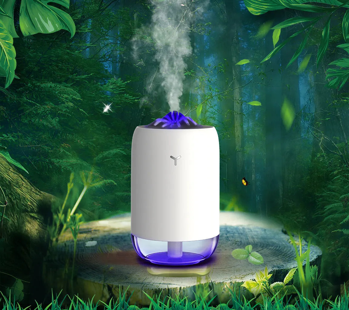 Magic Flame columnar USB humidifier in light blue, pink, or white colours for desktop use