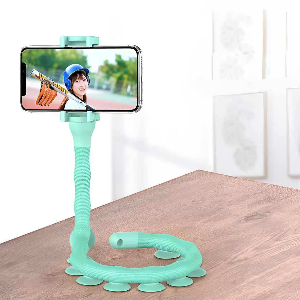 Flexible rubber phone holder with suction cup wrapped around bicycle handlebar