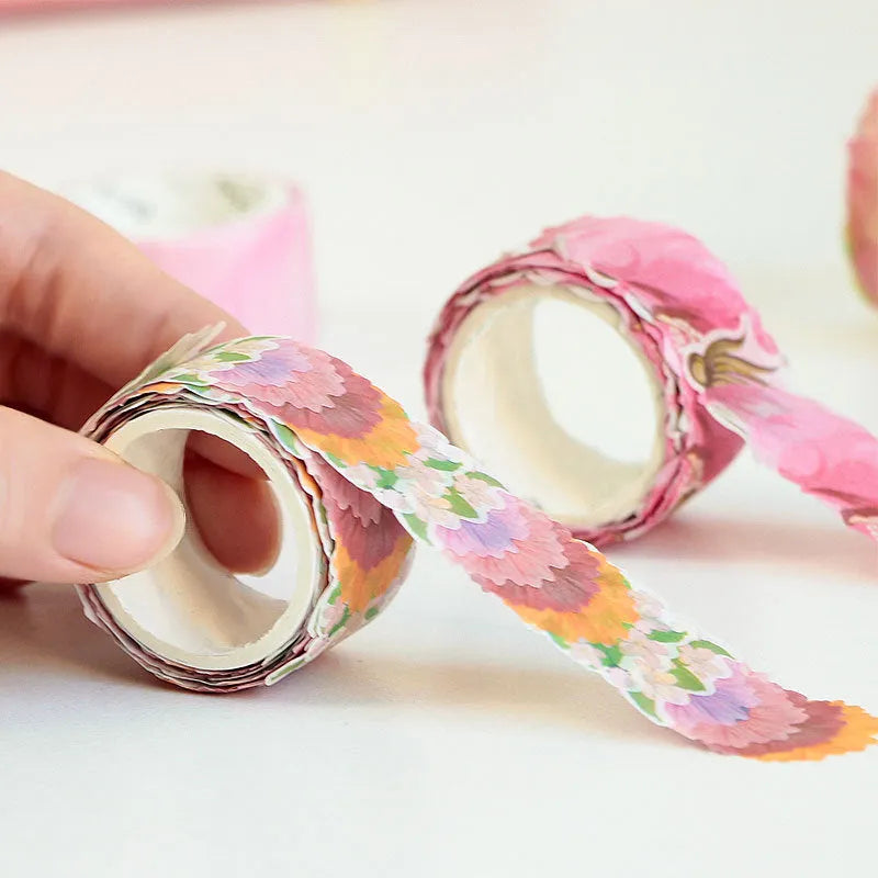 Clover pattern decorative paper tape roll showing blue, cherry blossom, mixed colour and violet options