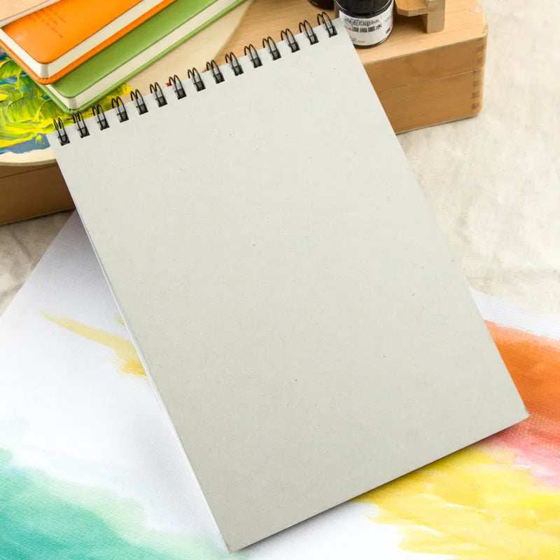 Green-coloured spiral-bound water-soluble lead sketchbook in 8K and 16K sizes.