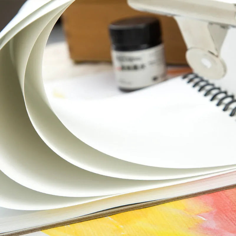 Green-coloured spiral-bound water-soluble lead sketchbook in 8K and 16K sizes.