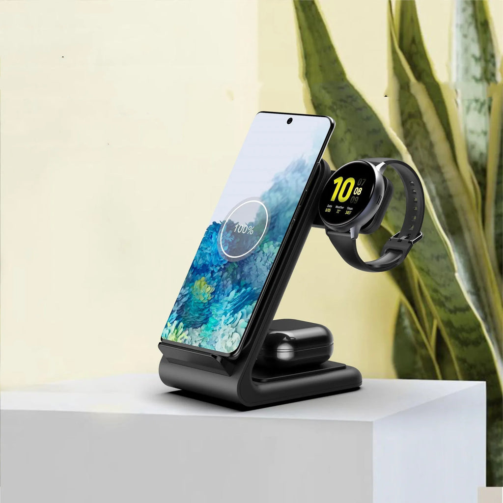 Black three-in-one wireless charging bracket holding an iPhone and a Samsung smartwatch