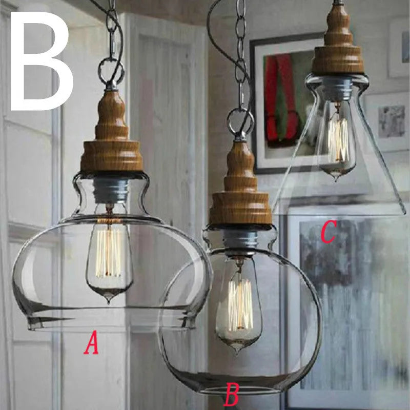 Nordic style single head pendant light with wood grain glass shade on adjustable cable.