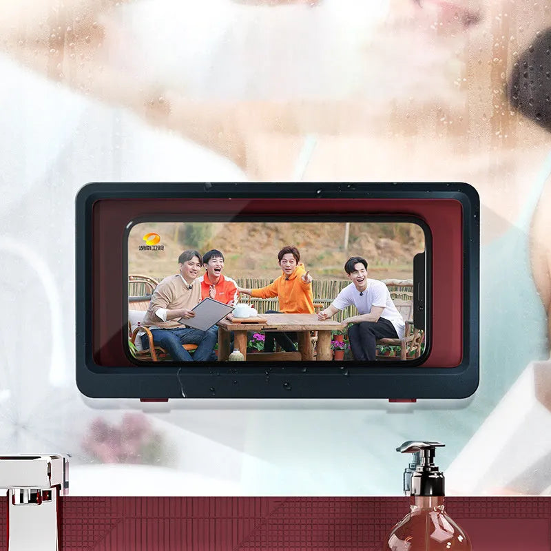 White adhesive waterproof phone holder mounted on a bathroom tile wall holding a mobile phone.