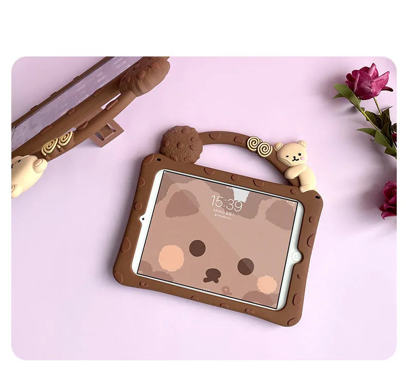 Brown cartoon-style silicone sleeve with a fold-out bracket stand for an iPad tablet.
