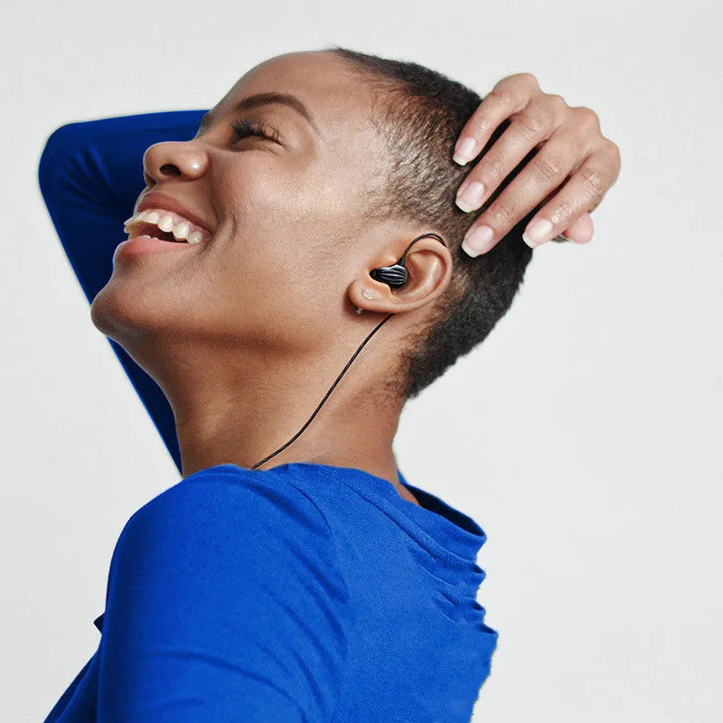 In-ear sports headphones with back-wound over-ear design in black, white, and red colours with 3.5mm plug