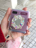 Samsung Galaxy Z Flip protective case with diagonal diamond hair powder hair ball cartoon design.