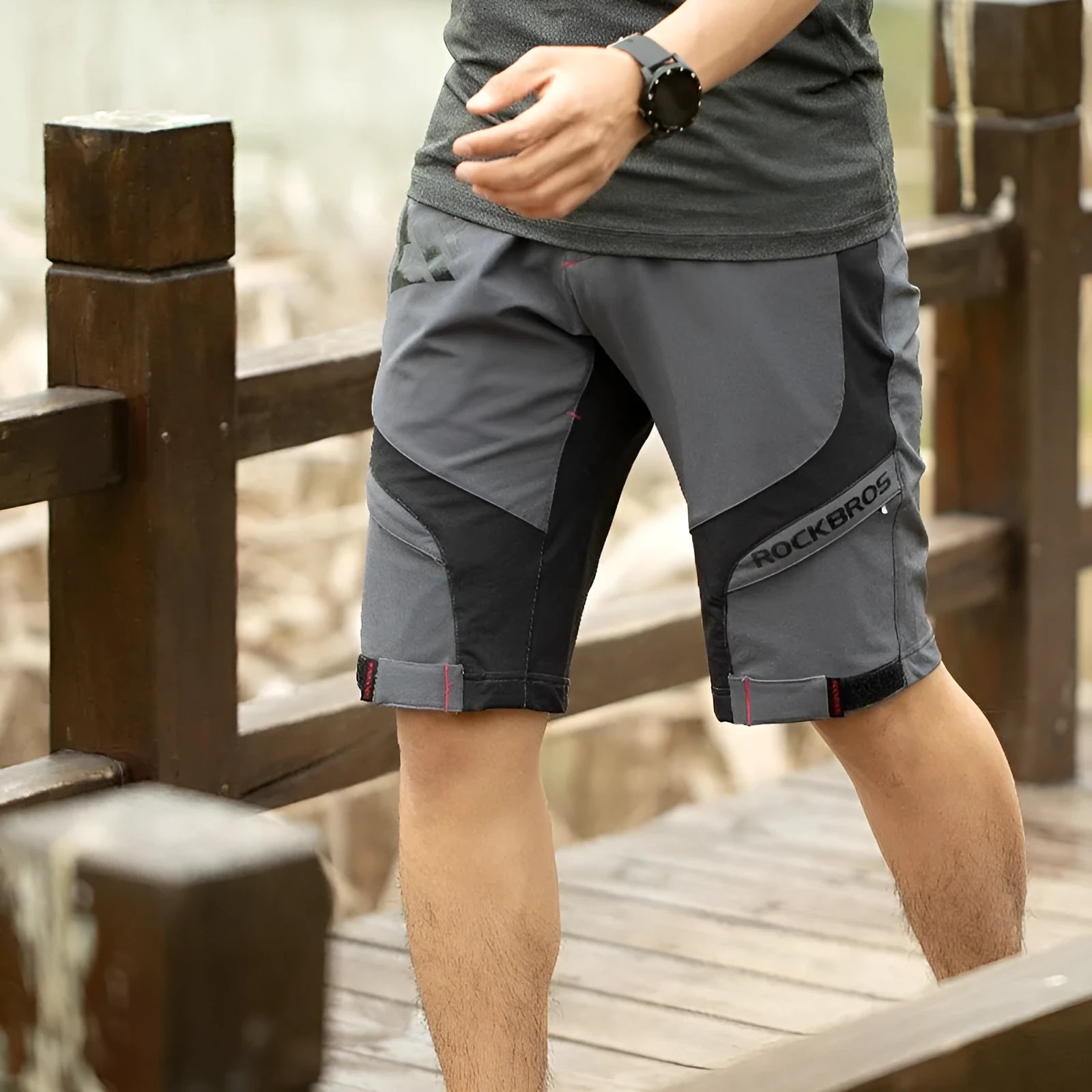 Men's quick-dry double-layer cycling shorts with sponge cushion in black on a plain background
