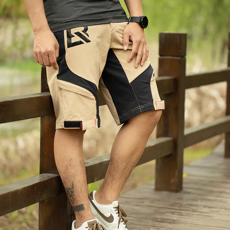 Men's quick-dry double-layer cycling shorts with sponge cushion in black on a plain background