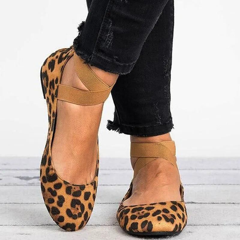 Women's leopard print PU flat shoes with elastic strap and round toe, side view