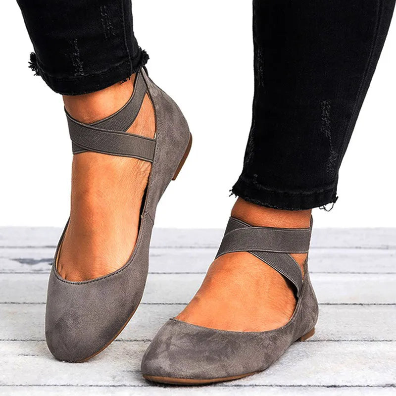 Women's leopard print PU flat shoes with elastic strap and round toe, side view