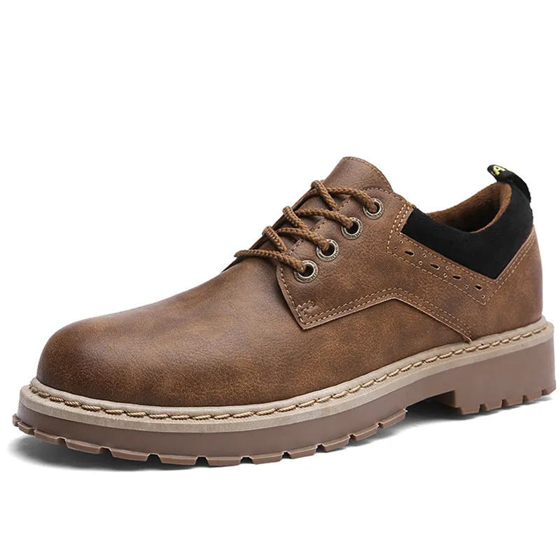 Men's brown round-toe casual shoes with front-tie laces and a low-profile rubber sole on a plain background.