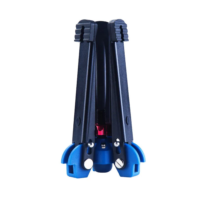 Black portable three-prong base for SLR camera with 75 mm ground clearance and 145 mm foot length