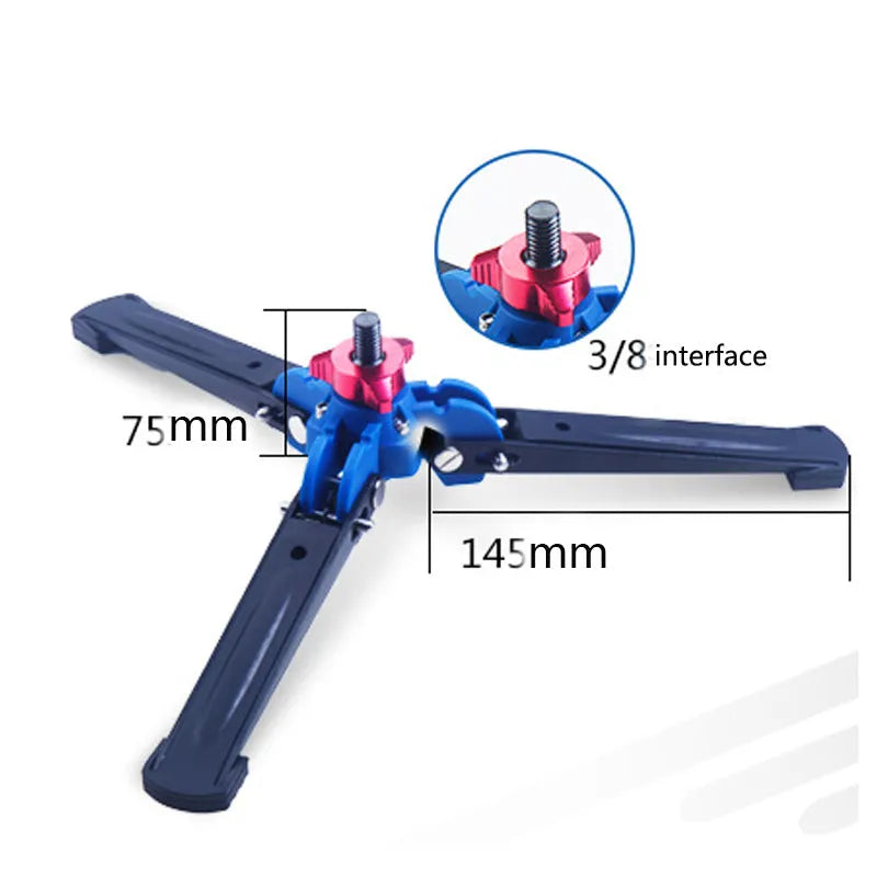 Black portable three-prong base for SLR camera with 75 mm ground clearance and 145 mm foot length