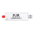 Black metal all-band software radio receiver with golden SMA connector for 25MHz-1700MHz range and ADSB.
