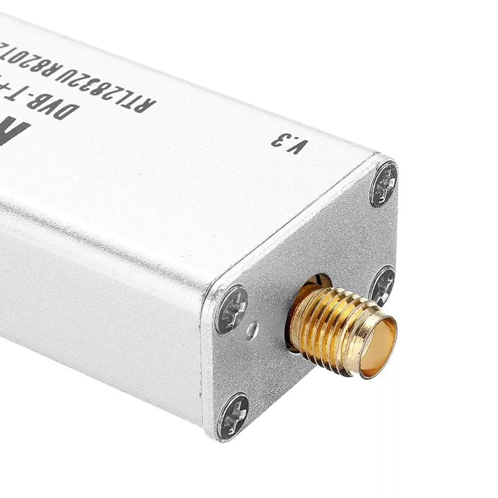 Black metal all-band software radio receiver with golden SMA connector for 25MHz-1700MHz range and ADSB.