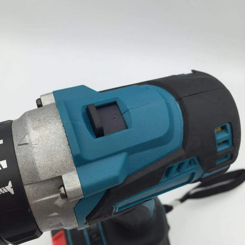21V cordless impact drill with keyless chuck and lithium battery on a workbench with drill bits.