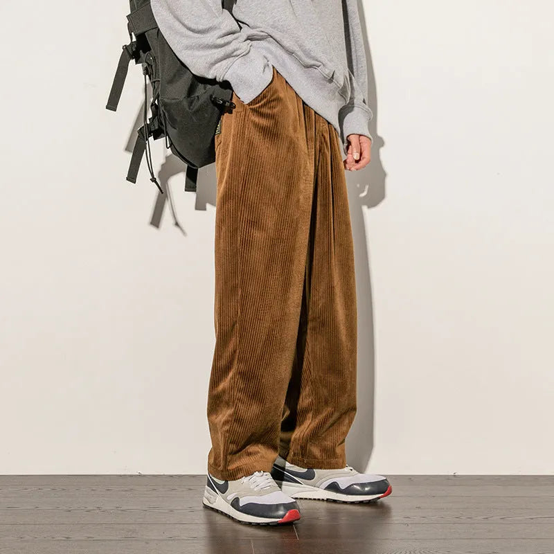 Men's Japanese-style corduroy trousers in black or brown, 95% polyester blend, sizes M to 5XL