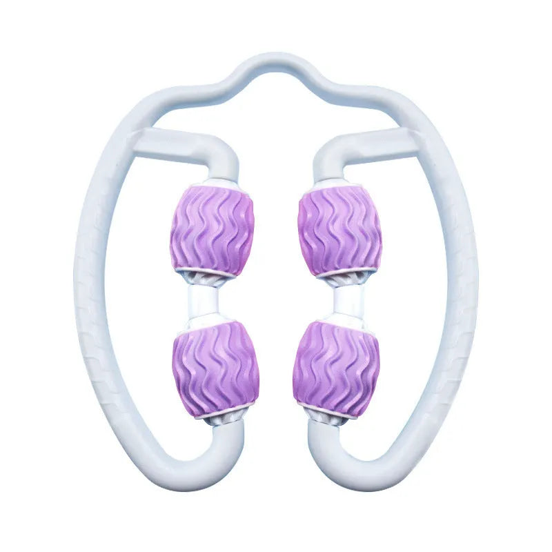 Purple and pink silicone annular leg massage rollers for fitness.