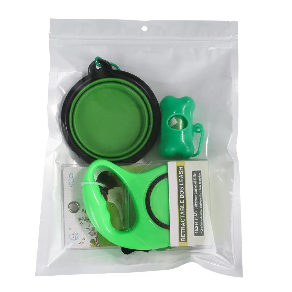 Dog traction rope set with folding PP bowl in blue and green on outdoor surface