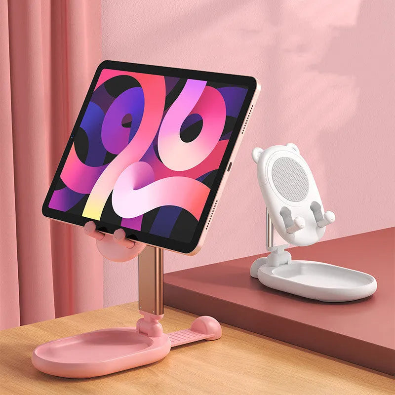 Blue foldable mobile phone holder with mirror holding an iPhone on a desk