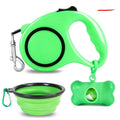 Dog traction rope set with folding PP bowl in blue and green on outdoor surface