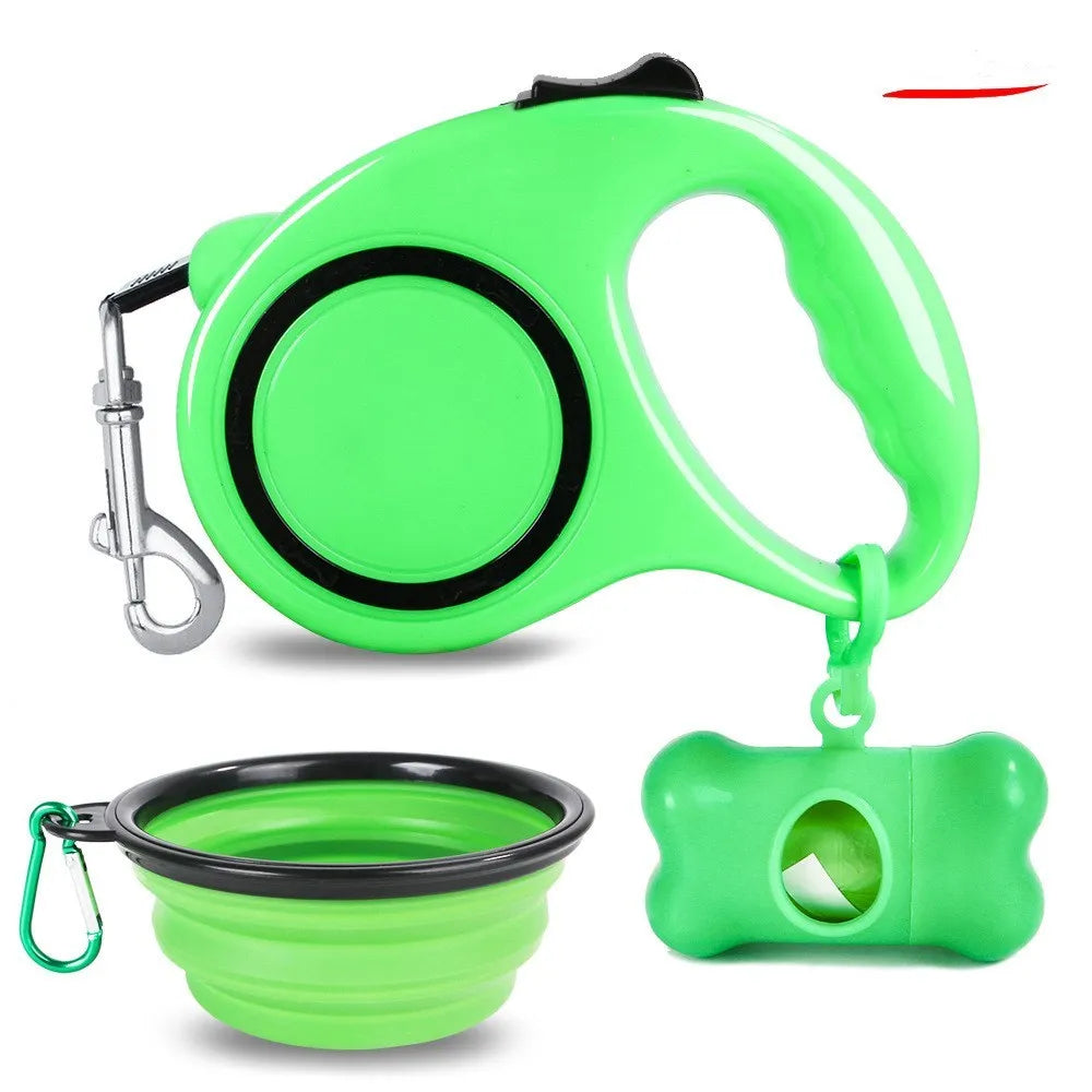 Dog traction rope set with folding PP bowl in blue and green on outdoor surface