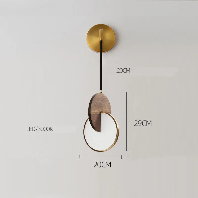Long-line modern chandelier made from carved solid walnut wood, mounted on a wall, emitting warm white light.