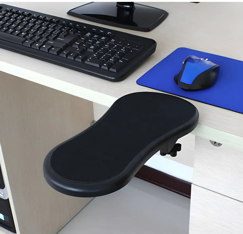 Black plastic rotating computer hand bracket wrist pad showing 180-degree adjustment on a desk.