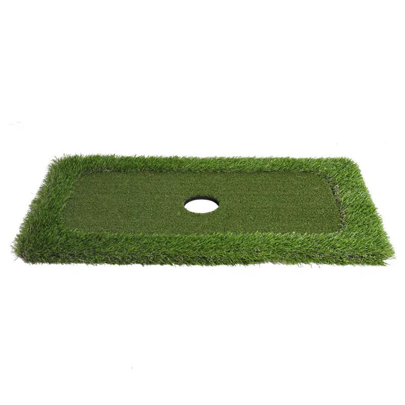 Green golf training mat on flat surface showing polypropylene grass texture and EVA foam base