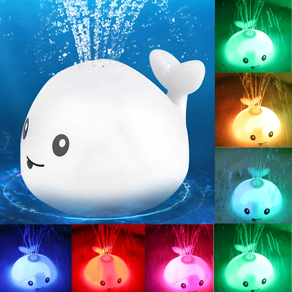 Floating grey and white whale bath toy spraying water with LED lights