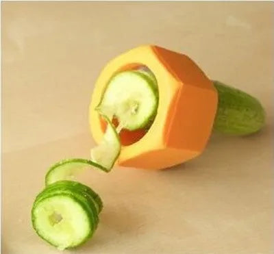 Yellow and green plastic spiral vegetable cutter for slicing cucumber, 8cm in diameter.
