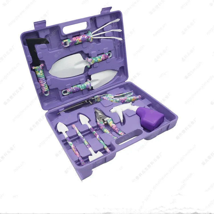 Purple printed 10-piece PP plastic garden tool set in open box showing various hand tools
