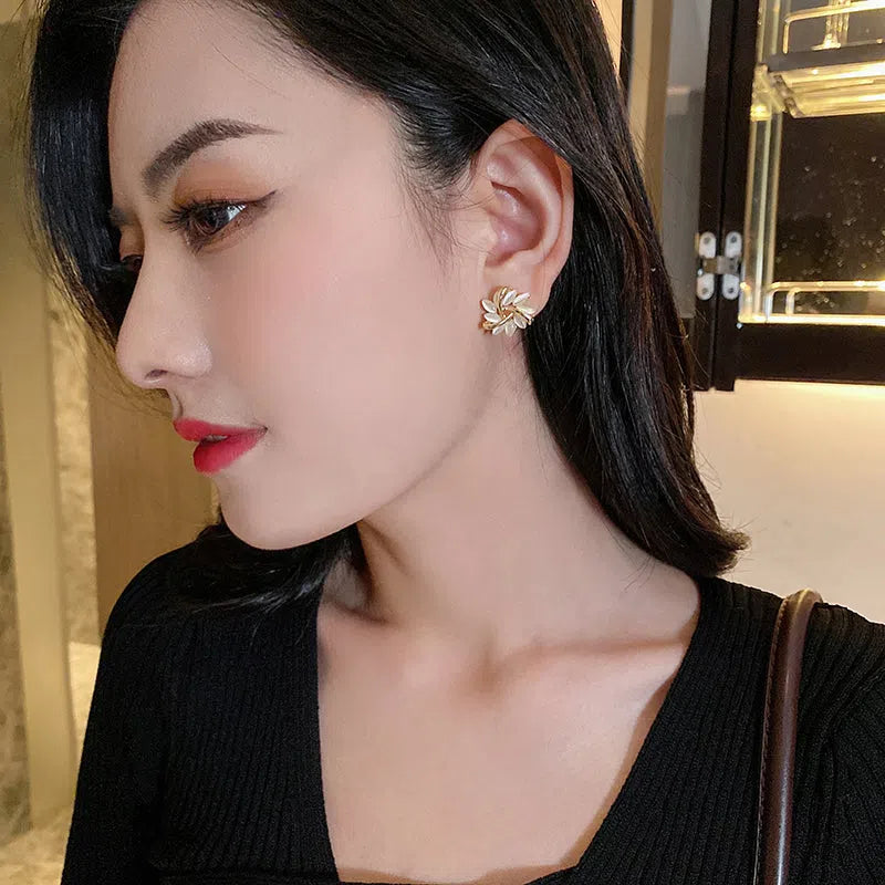 Opal cat's eye flower stud earrings in silver with geometric square and triangle design, Japanese Korean style